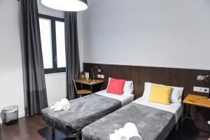 Postel nebo postele na pokoji v ubytování Traveller House