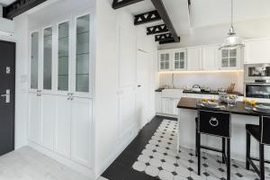 Kuchyň nebo kuchyňský kout v ubytování Super-Apartamenty VIP Old Town + 7 fotografií