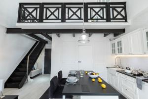 Kuchyň nebo kuchyňský kout v ubytování Super-Apartamenty VIP Old Town