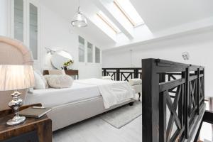 Postel nebo postele na pokoji v ubytování Super-Apartamenty VIP Old Town