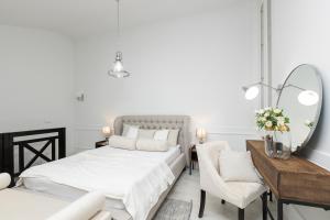 Postel nebo postele na pokoji v ubytování Super-Apartamenty VIP Old Town