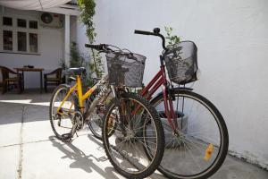 two bikes are parked next to a house at Ohrid Center Galerie House in Ohrid