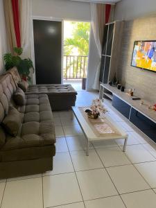 TV a/nebo společenská místnost v ubytování Apartamento Completo no Beach Living Porto das Dunas - Apto Luxo