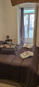 A bed or beds in a room at le ginestre in centro