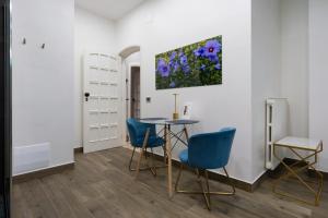 TV a/nebo společenská místnost v ubytování Hotel Ibisco Suites & Relax