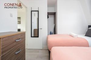 Postel nebo postele na pokoji v ubytování CONEN Aplite Apartment
