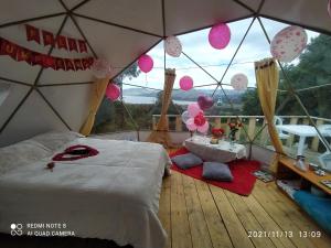 Postel nebo postele na pokoji v ubytování Skyline Glamping Guasca