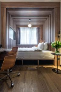 Een bed of bedden in een kamer bij Radisson Blu, Basel