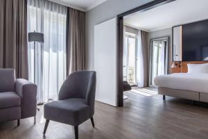 Een bed of bedden in een kamer bij Radisson Blu, Basel
