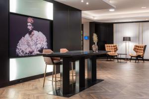 Een TV en/of entertainmentcenter bij Radisson Blu, Basel
