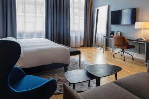 Postel nebo postele na pokoji v ubytování Radisson Blu 1919 Hotel, Reykjavík