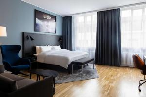 Postel nebo postele na pokoji v ubytování Radisson Blu 1919 Hotel, Reykjavík