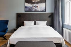 Postel nebo postele na pokoji v ubytování Radisson Blu 1919 Hotel, Reykjavík