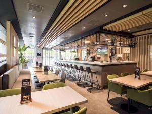 En restaurang eller annat matställe på Executive Residency by Best Western Amsterdam Airport