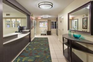 a corridor of a hospital room with a hallway at Sonesta Simply Suites Nanuet in Nanuet