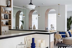 a kitchen with a counter with a blue vase at Le Riviera Collection, Signature Collection by Best Western in Nice