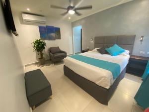 Кровать или кровати в номере Hotel Naoz