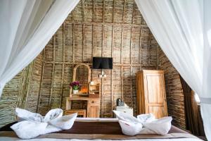 TV a/nebo společenská místnost v ubytování Unicorn Bungalow