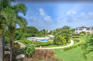 an aerial view of a house with a garden at Sago Garden Apartment at Royal Westmoreland in Saint James +13 photos