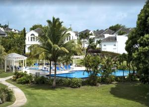 an aerial view of a resort with a swimming pool at Sago Garden Apartment at Royal Westmoreland in Saint James