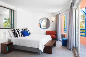 Letto o letti in una camera di SALT of Palmar, an adult-only boutique Hotel