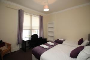 Krevet ili kreveti u jedinici u okviru objekta 2 bed flat, Cambuslang, Glasgow, free parking