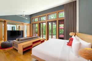 Ein Bett oder Betten in einem Zimmer der Unterkunft W Koh Samui