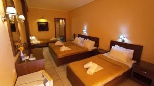 Postel nebo postele na pokoji v ubytování Hotel Lito