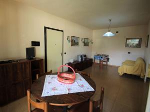a room with a table with a basket on it at Apartment Il Piccolo by Interhome in Toscolano Maderno