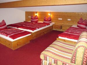 A bed or beds in a room at Apartment Gasthof Almluft-3 by Interhome