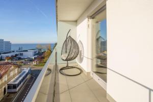 A balcony or terrace at W Rent like home - Balticus 49A