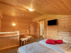 A television and/or entertainment centre at Chalet Talbach by Interhome