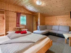 A seating area at Chalet Talbach by Interhome