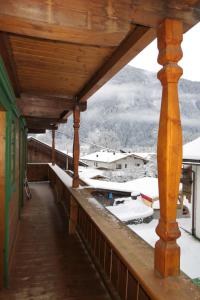 a porch of a house with snow on the ground at Holiday Home Rieplerhof by Interhome in Mayrhofen