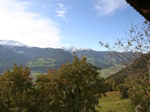 a view of a valley with mountains in the background at Holiday Home Hochzillertalblick by Interhome in Gattererberg
