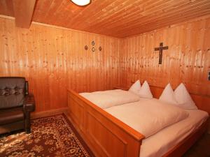 Katil atau katil-katil dalam bilik di Holiday Home Hochzillertalblick by Interhome