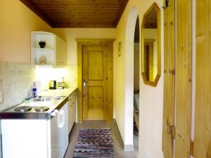 Η κουζίνα ή μικρή κουζίνα στο Holiday Home Berghaus by Interhome +33 φωτογραφίες