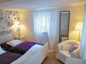 Ein Bett oder Betten in einem Zimmer der Unterkunft Villa Marie-Sophie by Interhome
