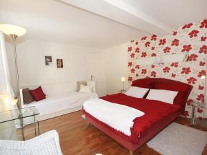 Ein Bett oder Betten in einem Zimmer der Unterkunft Villa Marie-Sophie by Interhome