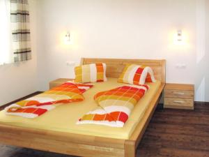 A bed or beds in a room at Apartment Leonie by Interhome