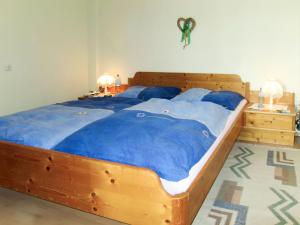 Posteľ alebo postele v izbe v ubytovaní Apartment Aktiv - HBN220 by Interhome