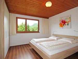 Posteľ alebo postele v izbe v ubytovaní Apartment Trummer by Interhome