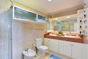 A bathroom at Apartment El Confital RF18 by VillaGranCanaria