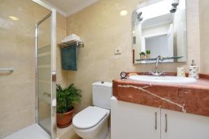 A bathroom at Apartment El Confital RF18 by VillaGranCanaria