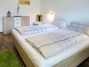 Posteľ alebo postele v izbe v ubytovaní Apartment Gitti by Interhome