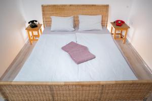 Posteľ alebo postele v izbe v ubytovaní Pajta Apartman