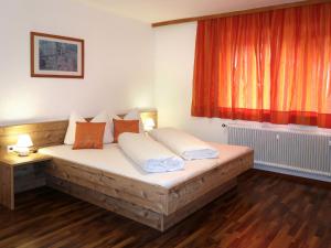 Postel nebo postele na pokoji v ubytování Apartment Pelinka-2 by Interhome