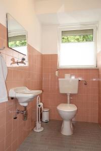Koupelna v ubytování Apartment Pelinka-2 by Interhome