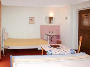 Postel nebo postele na pokoji v ubytování Apartment Leni-2 by Interhome