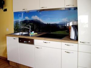 Kuchyň nebo kuchyňský kout v ubytování Apartment Apart Grazia-2 by Interhome + 18 fotografií